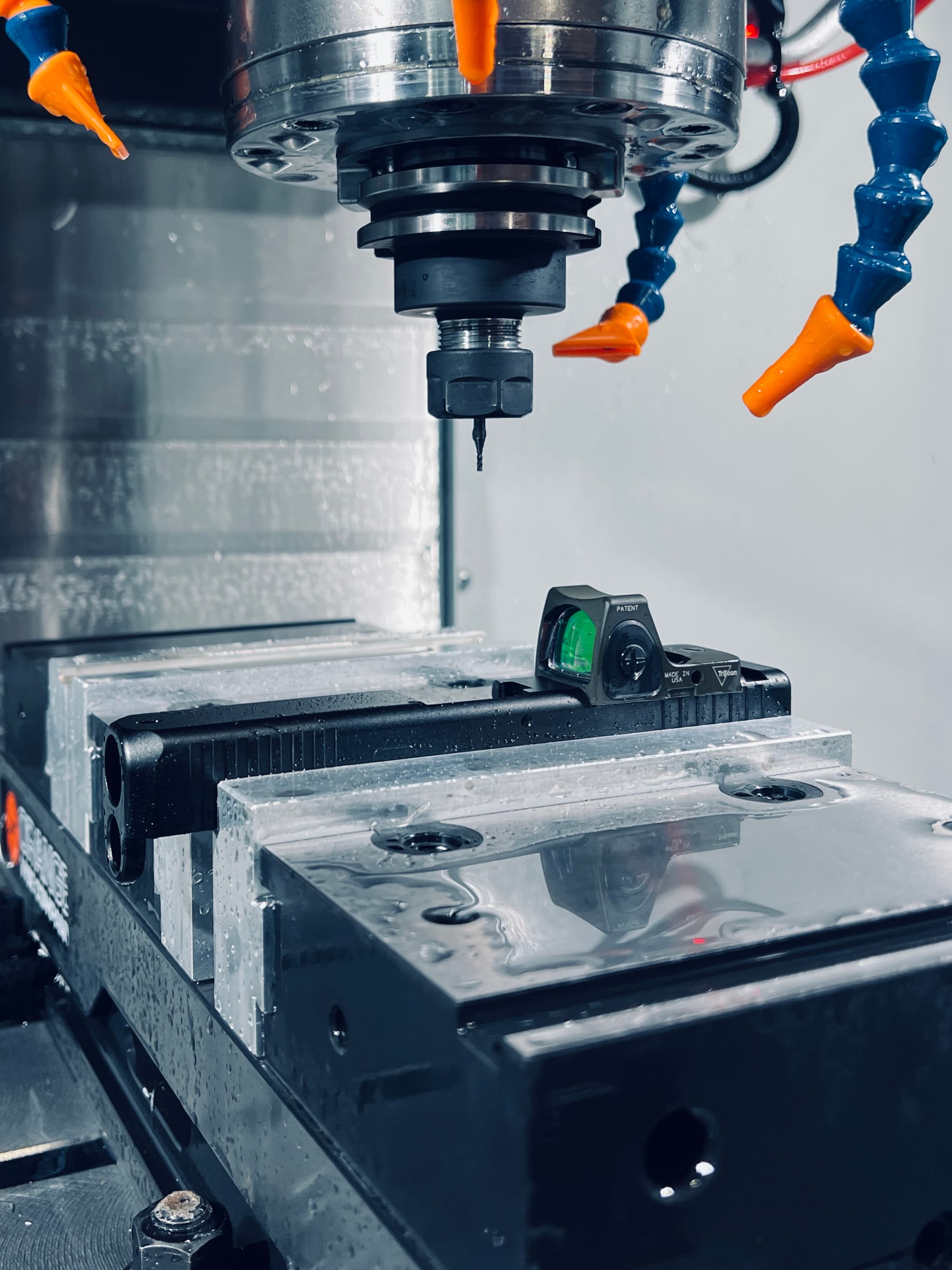 CNC machine milling an RMR optic cut